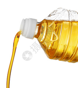 素食主义者将油浇在白底的瓶子里做饭向日葵烹饪食物金子饮食皮肤玉米调味品大豆液体背景
