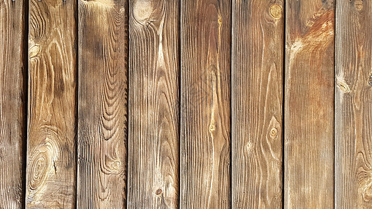 垂直板的棕色背景 棕色板的自然背景 面板由木头制成 具有美丽自然图案的木质纹理图片