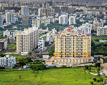商业建筑马哈拉施特拉邦Pune山附近正在建造的高楼图象背景