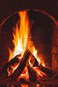 燃烧火烟囱危险日志红色橙子活力石头木头营火烧伤图片