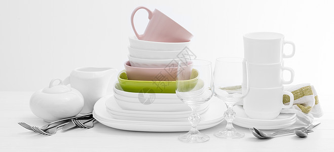 彩色广场盘和杯子眼镜银器服务食物玻璃制品陶器叉子餐具抹布图片