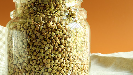 谷物玻璃罐中生有机荞麦的绿芽 素食食品的概念 有机食品 饮食 减肥 健康和适当营养的概念 复制文本的空间节食玻璃活力生物种子维生图片