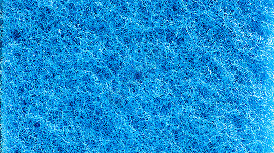 蓝色多孔结构形式的背景 宏观海绵 特写带纹理的背景的蓝色海绵表面 复制空间浴室家务厨具厨房洗澡擦洗清洁工家政泡沫卫生图片