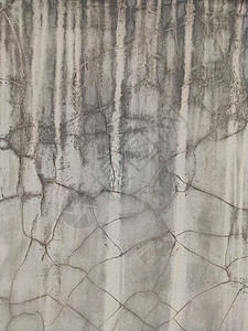 灰色水泥纹理旧墙壁 涂有剥皮油漆 刮痕和裂缝边界石头石膏建筑学材料背景图片