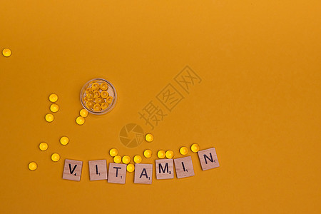 多种背景丰富多彩 许多透明的太阳药片维生素D3 健康补充剂和药品图片