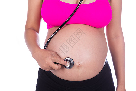 孕妇和医生孕妇有听诊器 听取婴儿的肚子医疗女性身体成人父母母亲女士检查白色医生背景