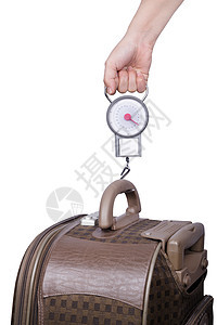 乘客在飞行前用秤检查行李重量 与白色隔离平衡运输航班测量乐器标签数字案件飞机场旅行图片