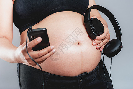 怀孕妇女肚子生长幸福婴儿歌曲女性母亲生育成人拥抱家庭图片