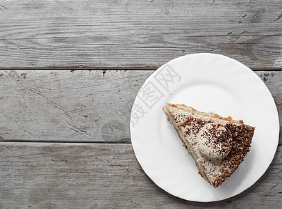 小菜一碟咖啡店蛋糕盘子飞碟美食黑色甜点早餐棕色糕点图片