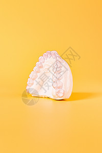 近视牙盘个人牙托口服矫形牙科主题 手持隐形牙套产品病人玻璃矫正口腔科假牙牙齿个性牙医药品图片