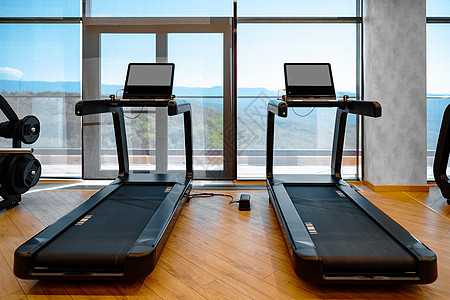现代体育馆专业跑步机演播室拍摄建筑工作室闲暇中心身体有氧运动地面健身俱乐部机器图片