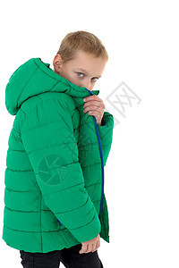 穿冬衣的时髦男孩绿色夹克照片衣服青少年服装材料服饰季节性运动图片