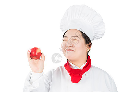 手持红苹果 微笑着的女厨师餐厅水果服务女士平底锅厨房工作管理人员工人帽子图片