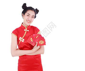 女人穿着青森服 拿着红包 概念是幸福的中国新年 在白种背景上隔绝文化信封女性微笑衣服旗袍裙子问候语快乐节日图片
