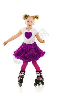 穿溜冰鞋的小女孩青年旱冰享受安全运动乐趣公园活动闲暇幸福图片