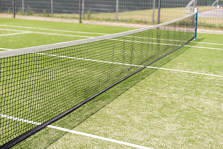 网球网和法庭 玩网球 健康生活方式宏观职业游戏球拍运动娱乐条纹行动闲暇网球场图片