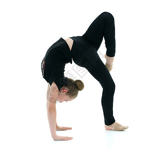 体操运动员用抬起的腿修桥杂技平衡演员身体训练乐趣闲暇工作室活动灵活性图片