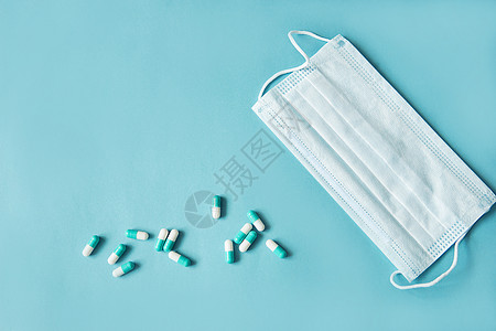 呼吸面具和蓝色底部胶囊里的药剂液体药店消毒诊断口罩物质防腐剂医生剂量卫生图片