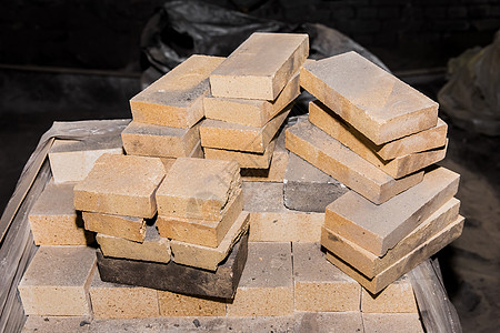 一堆耐火砖块 防火砖块建筑材料石头建筑耐火砖墙纸烤箱水泥材料黏土橙子图片