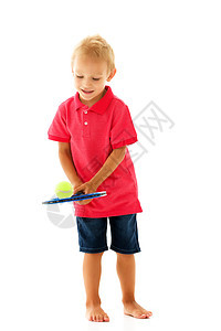 一个可爱的小男孩握着网球拍在手里微笑男人乐趣活动娱乐游戏玩家孩子锻炼童年图片