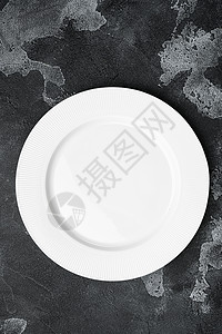 白盘空器具 带有文字或食物的复制空间 带有文字或食物的复制空间 顶视图平躺 黑色深石桌背景美食圆形制品商品纹理餐具服务盘子陶瓷白图片