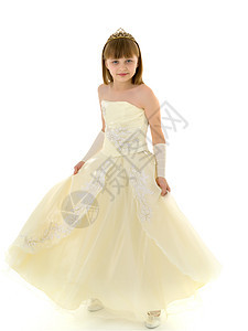 一个穿长长优雅公主礼服的小女孩喜悦孩子微笑戏服快乐派对庆典白色童年衣服图片