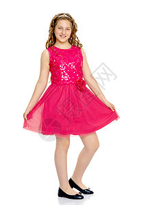 穿着裙子的优雅女孩头发青年衣服工作室快乐孩子乐趣幸福红色女儿图片