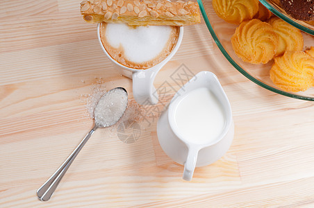 新鲜早餐咖啡和糕点蛋糕勺子液体房子糖果咖啡店杯子饼干服务小吃图片