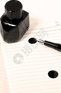 钢笔和笔记本写作文档商业文书签名喷泉工作白色页数笔记图片