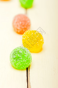 糖果冻水果糖果软糖团体宏观果味小吃甜点明胶童年食物橙子背景图片