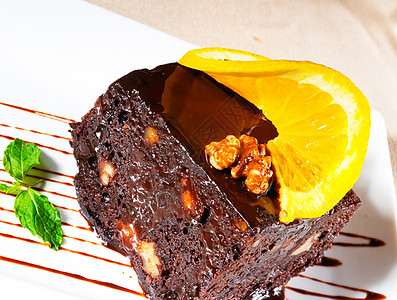 巧克力和胡桃蛋糕食物坚果橙子甜点核桃可可叶子咖啡蛋糕馅饼图片