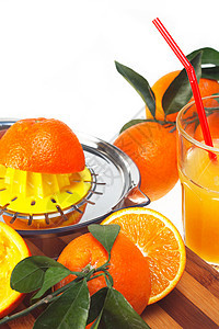 新鲜橙汁叶子稻草工作室食物水果木板橙子玻璃果汁营养图片