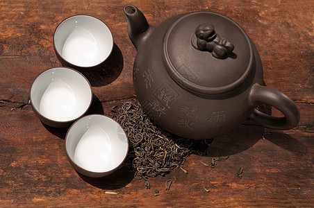中国绿色茶壶和杯子植物液体文化美食芳香香气竹子叶子传统饮料图片