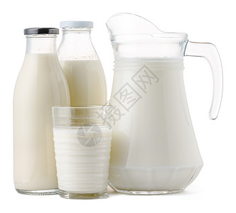 装满白色隔绝的鲜牛奶的玻璃盒饮料奶瓶器皿食物奶制品杯子玻璃瓶子产品液体图片