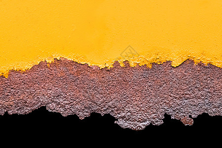 在旧金属质体上的黄橙色涂料 有腐蚀薄片的生锈模式图片