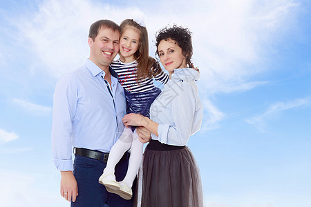 快乐的父母与一个小女儿乐趣女孩男性男人孩子微笑夫妻蓝色女士女性图片