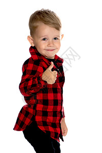 一个小男孩举起一只手指喜悦男性工作室手势解决方案微笑快乐情感幸福活动图片