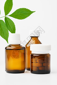 白色背景的棕色玻璃药瓶剂量草本植物药店药品制药疗法宏观眼镜药片卫生图片