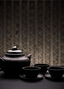 时间香味木桌飞碟陶瓷饮料杯子黑色制品热饮茶壶图片