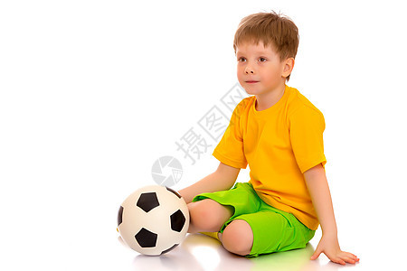 小男孩在玩足球球呢训练俱乐部娱乐冠军踢球者运动球员运动员团队男生图片