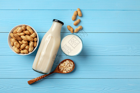 装在玻璃瓶里 有木板花生的维加花生牛奶玻璃坚果营养饮品素食瓶子产品乳制品饮食乳糖图片