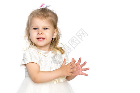 小女孩拍她的手婴儿家庭喜悦太阳女性手势快乐女儿乐趣手指图片