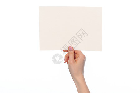 女性手持白纸空白白纸 与白色隔绝身份广告拇指手臂营销卡片商业职业文档手指图片