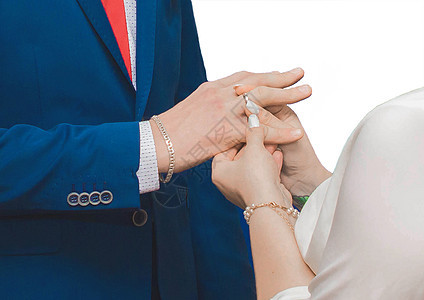 分享结婚戒指在婚礼特结时 在白色背景上 与世隔绝订婚交换妻子丈夫女士庆典套装成人面纱幸福图片