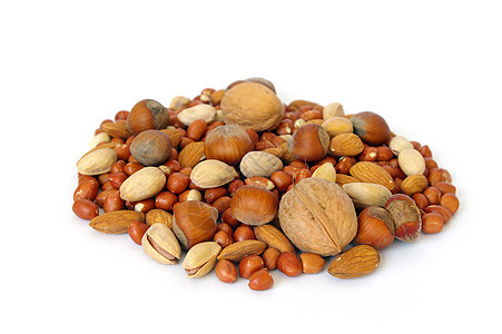 白背景上的 Nuts花生核桃农作物榛子坚果种子开心果食物宏观小吃图片