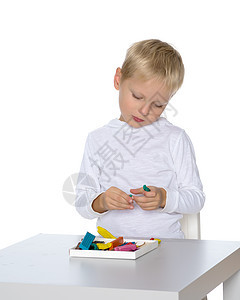 小男孩的塑胶雕塑橡皮泥课堂学习教育艺术训练游戏室幼儿园面团工艺图片