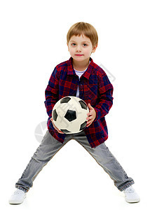 小男孩在玩足球球呢场地运动员孩子俱乐部青年幸福比赛体育场冠军运动图片