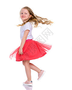一个快乐的小女孩在跳舞孩子芭蕾舞短裙班级微笑乐趣戏服舞蹈裙子婴儿图片