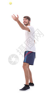 一边看 笑着男人用网球拍球拍成人爱好生活运动运动员微笑白色运动装男性图片