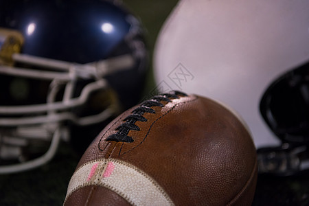 美国足球和头盔配件运动员帽子齿轮大学猪皮安全联盟鞋带体育场图片